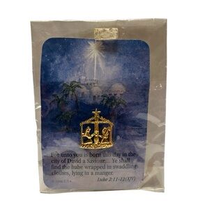 Natavity Lapel Pin in original package